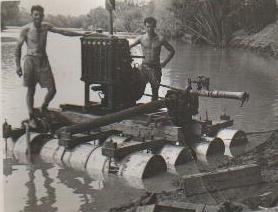 Duncan on the left. The irrigation system pump for the lucerne paddocks.